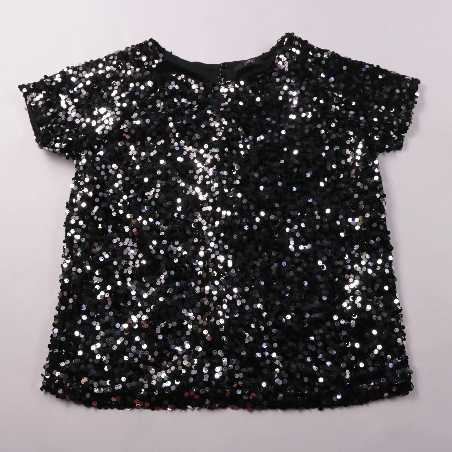 топ Next